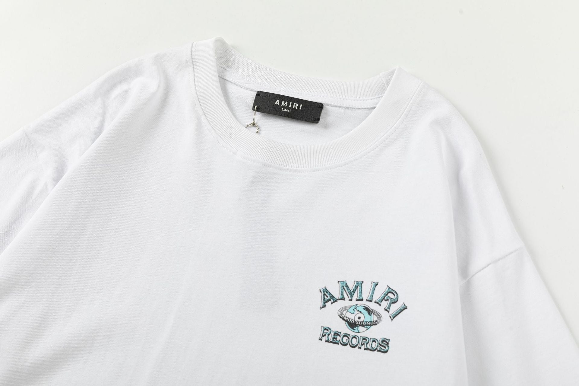 AMlRl Global records T-Shirt