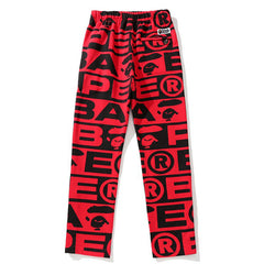 BAPE All over letter print sweatpants