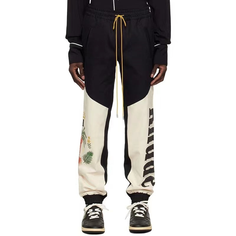 RHUDE Coconut tree and peace dove print stitching contrast color pants